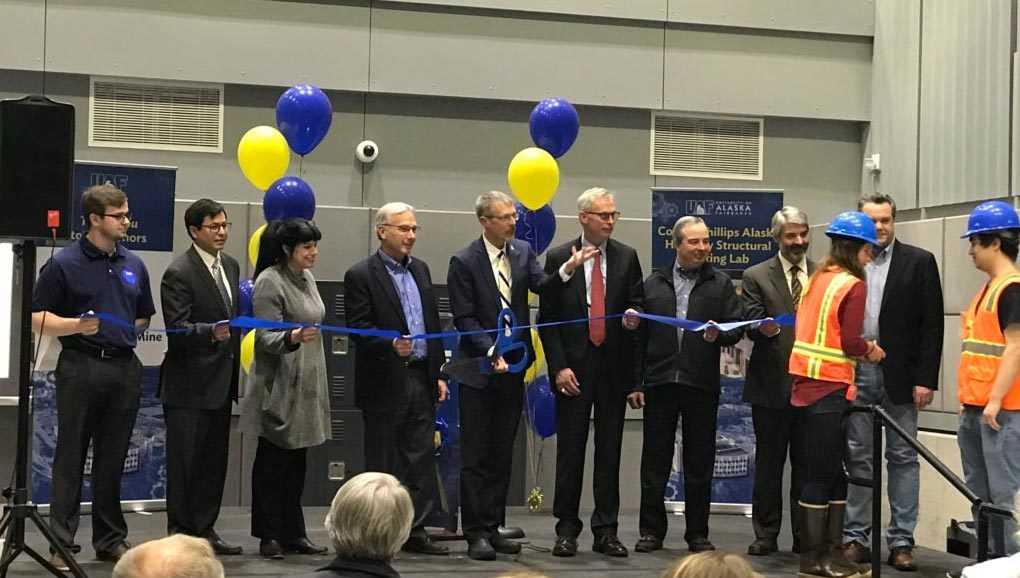 Team cutting ribbon